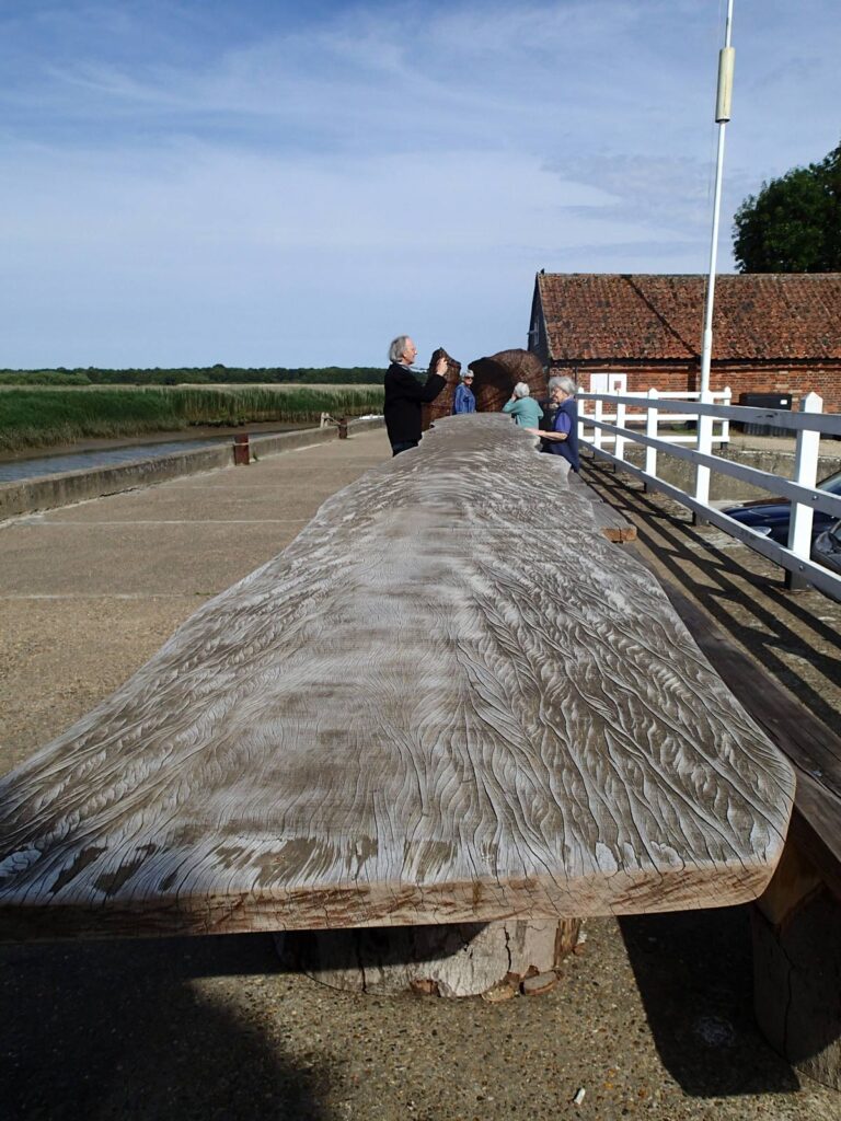 long wooden table with mum and dad at the far end