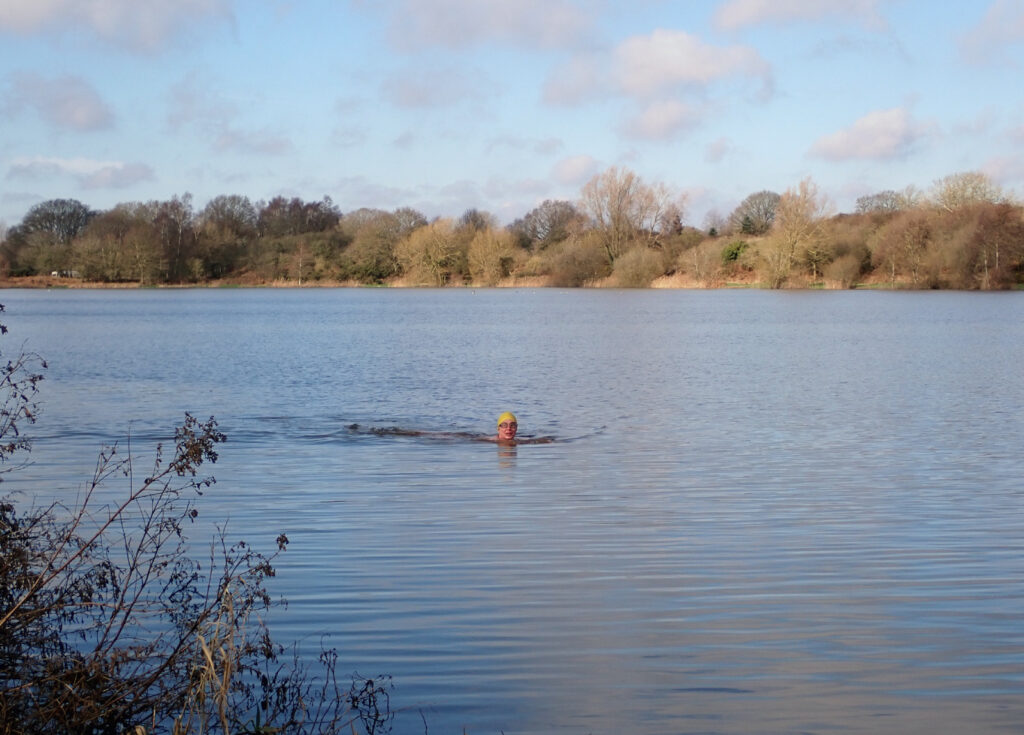 a swimmer in a lake